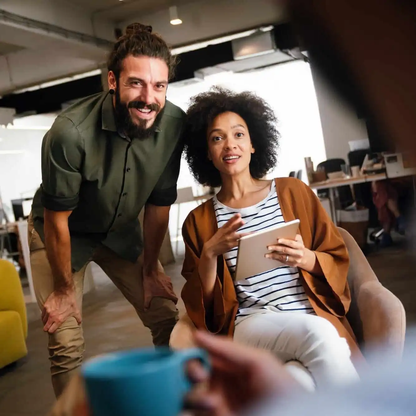 portrait-of-creative-business-people-team-working-together-and-smiling-in-office-uai-1334x1334