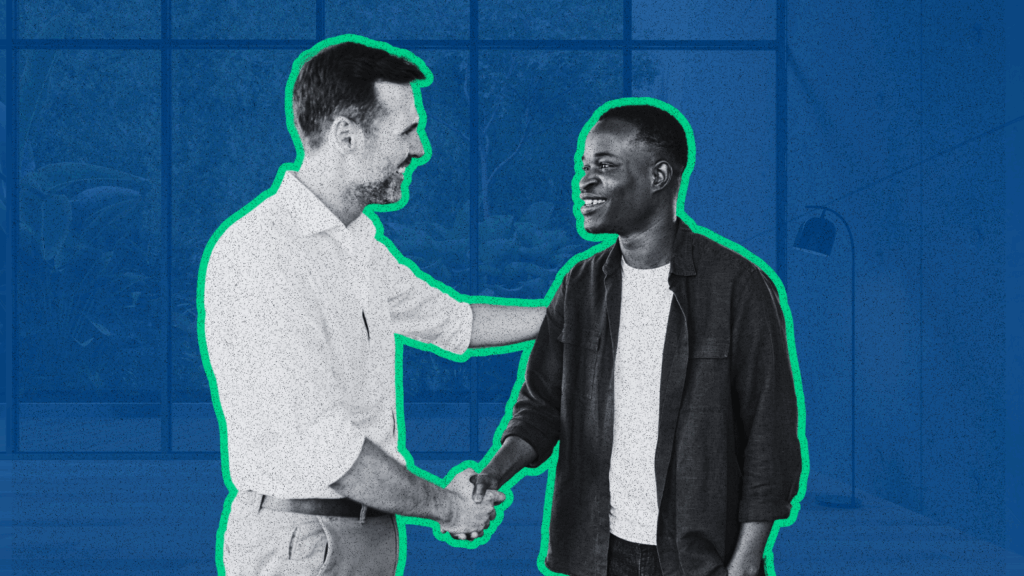 Property manager shaking hands with a newly onboarded vendor as part of a compliance process