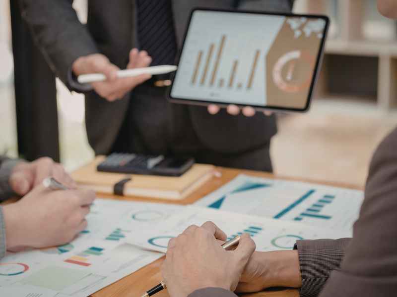 Property management team reviewing vendor performance information during a professional meeting